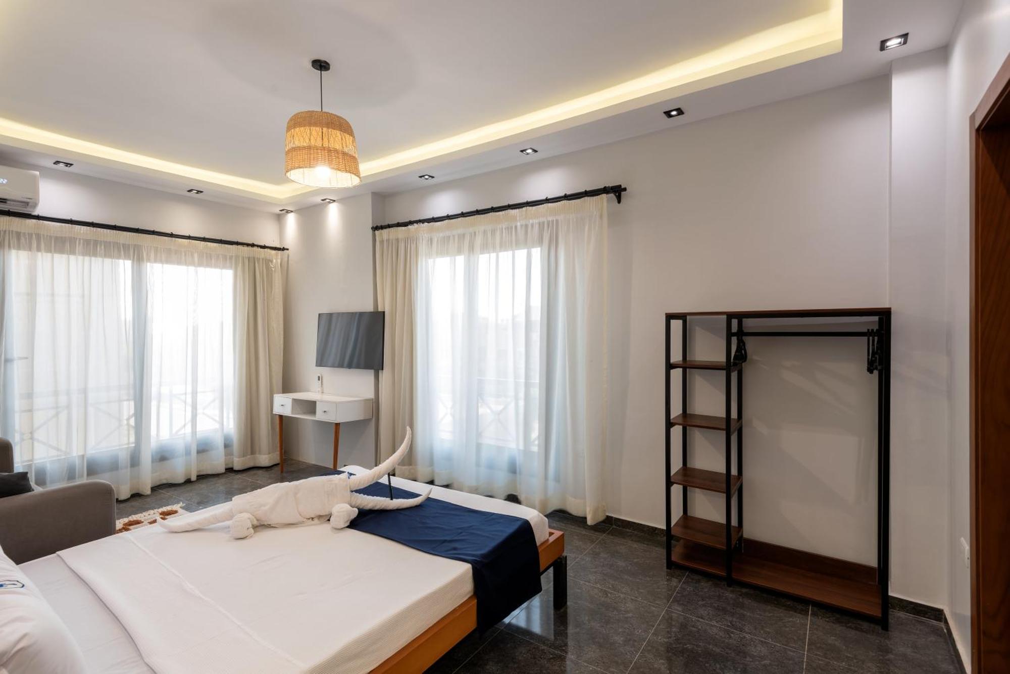 Travelholic Auc Residence Kaherah Luaran gambar