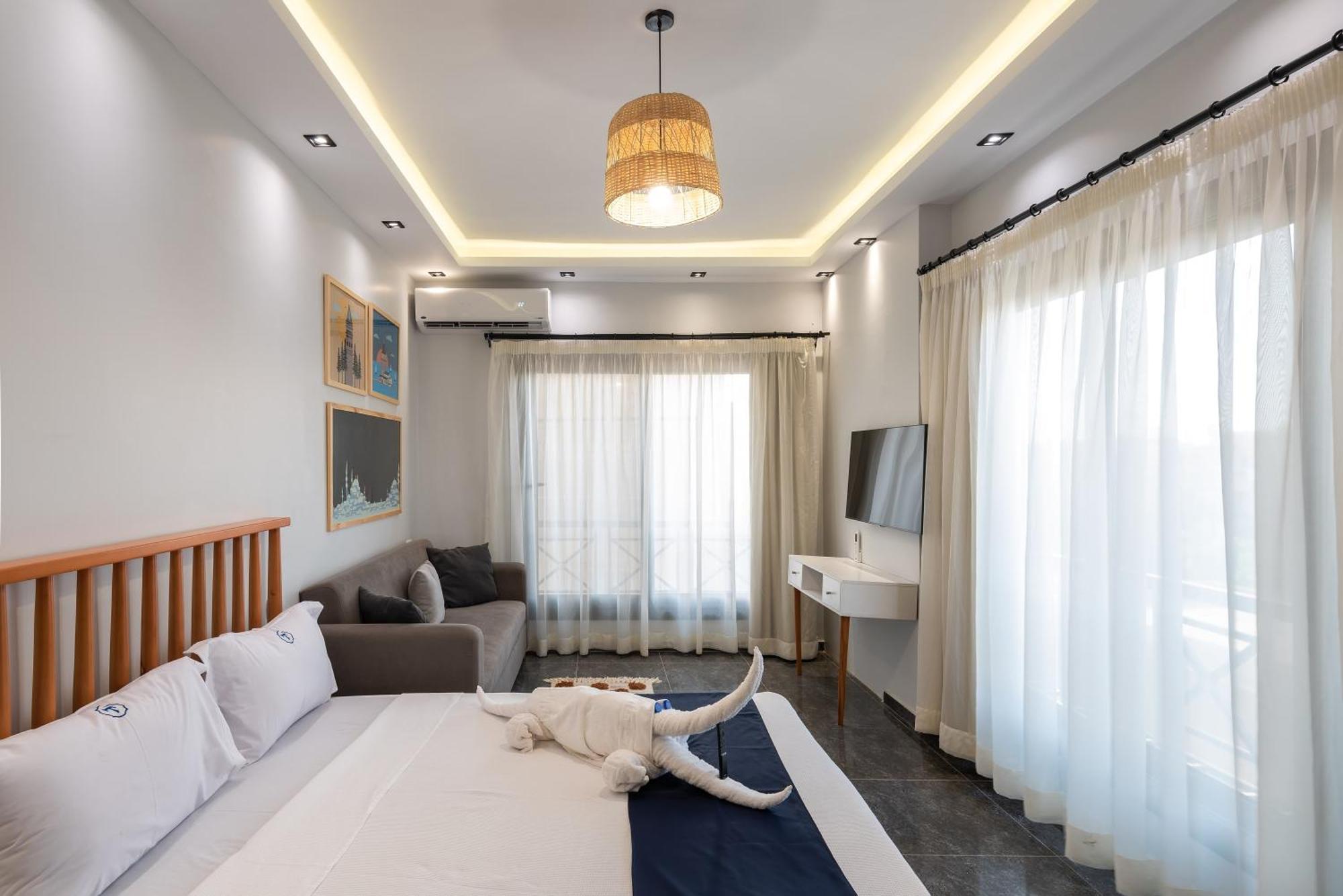 Travelholic Auc Residence Kaherah Luaran gambar