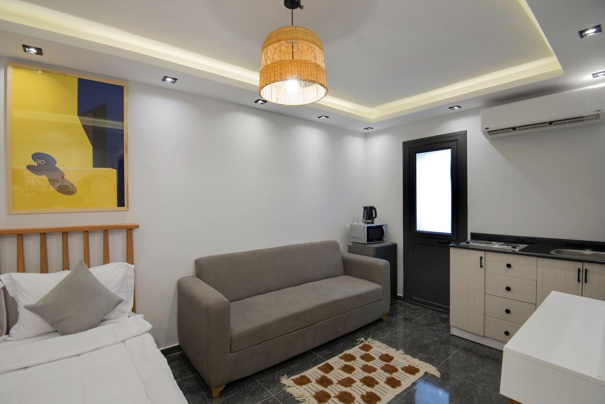 Travelholic Auc Residence Kaherah Luaran gambar