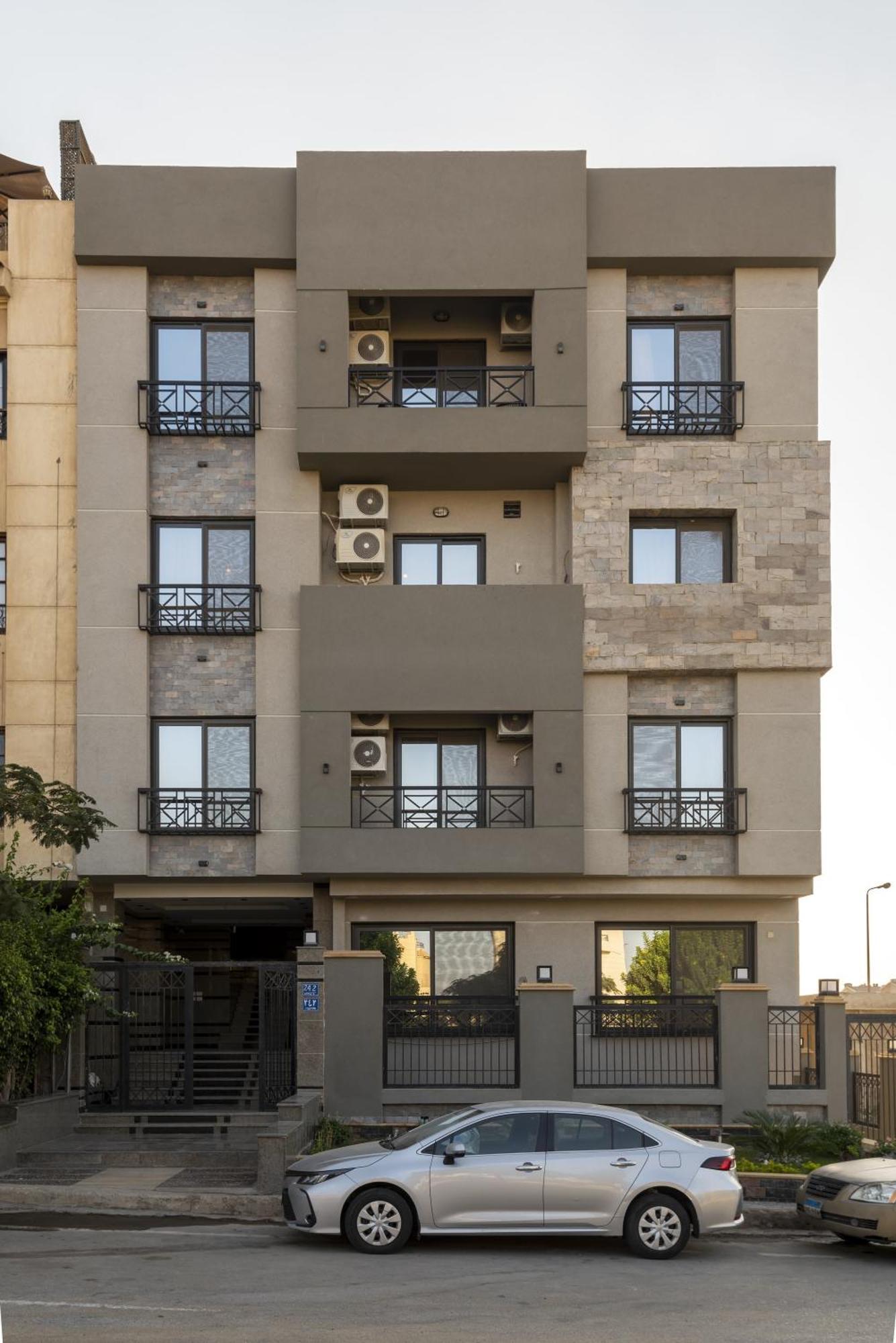 Travelholic Auc Residence Kaherah Luaran gambar