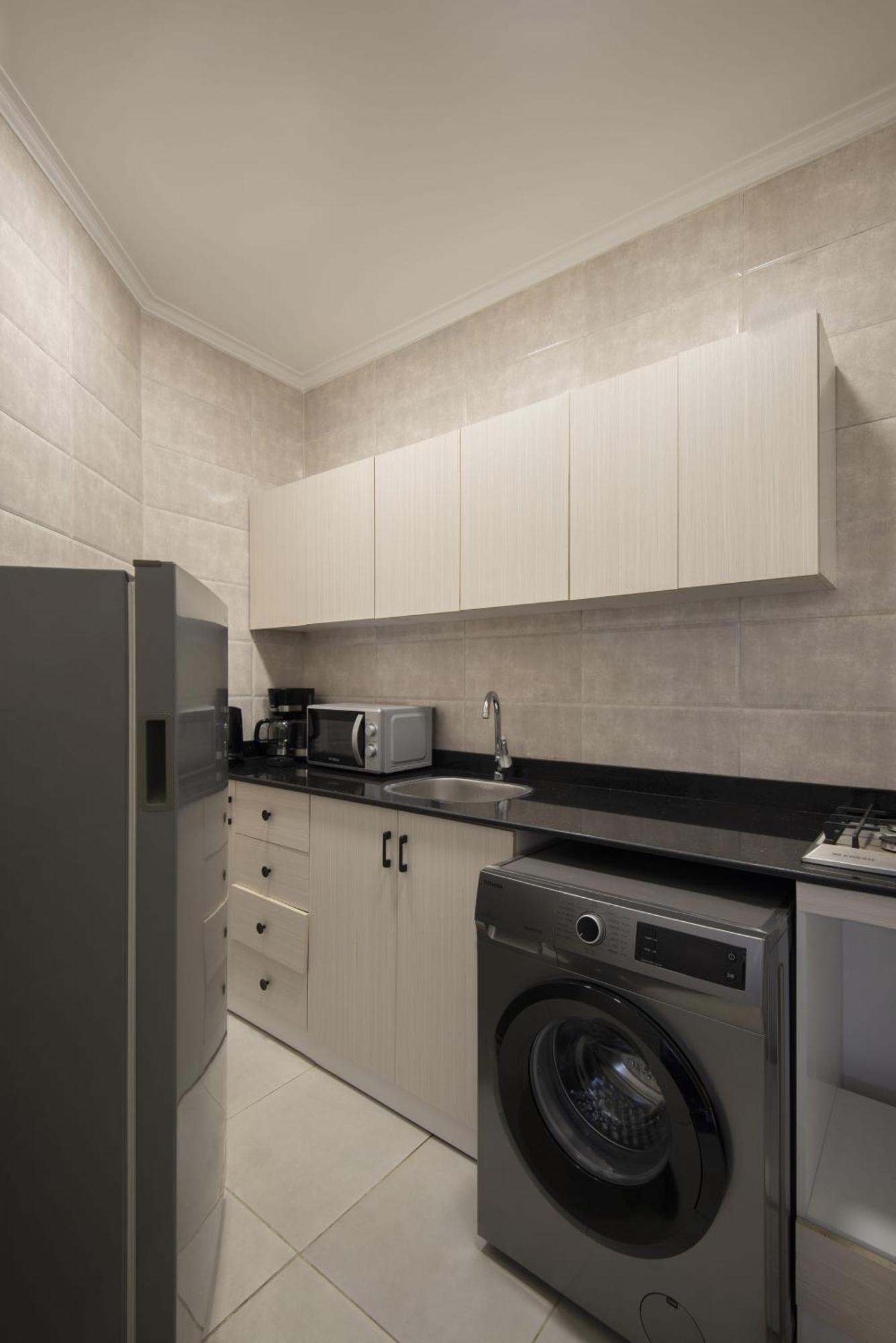 Travelholic Auc Residence Kaherah Luaran gambar