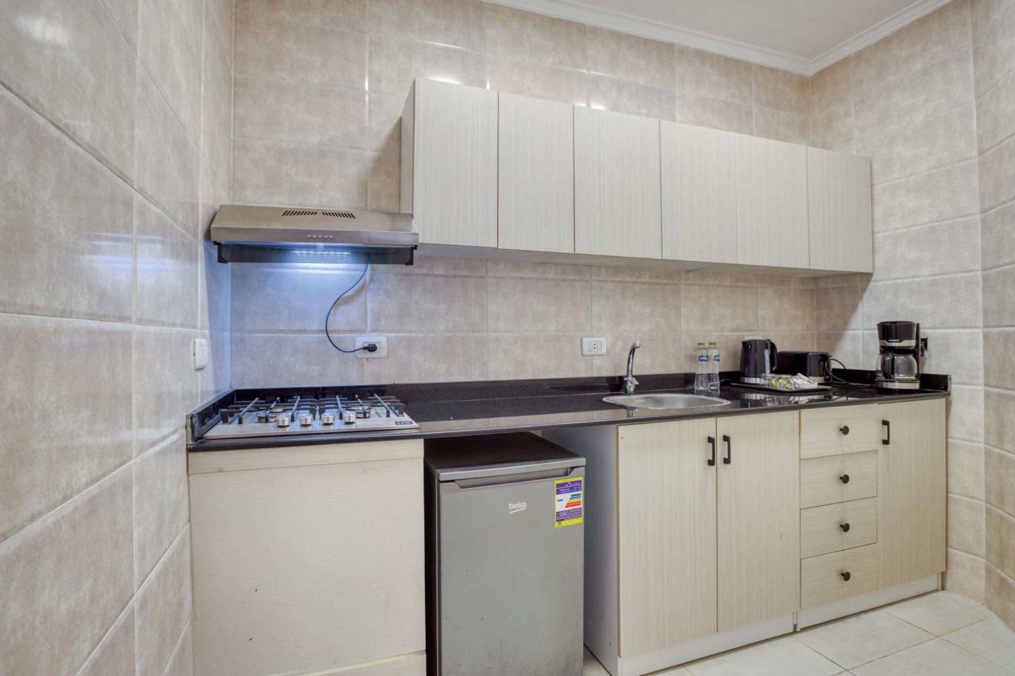 Travelholic Auc Residence Kaherah Luaran gambar