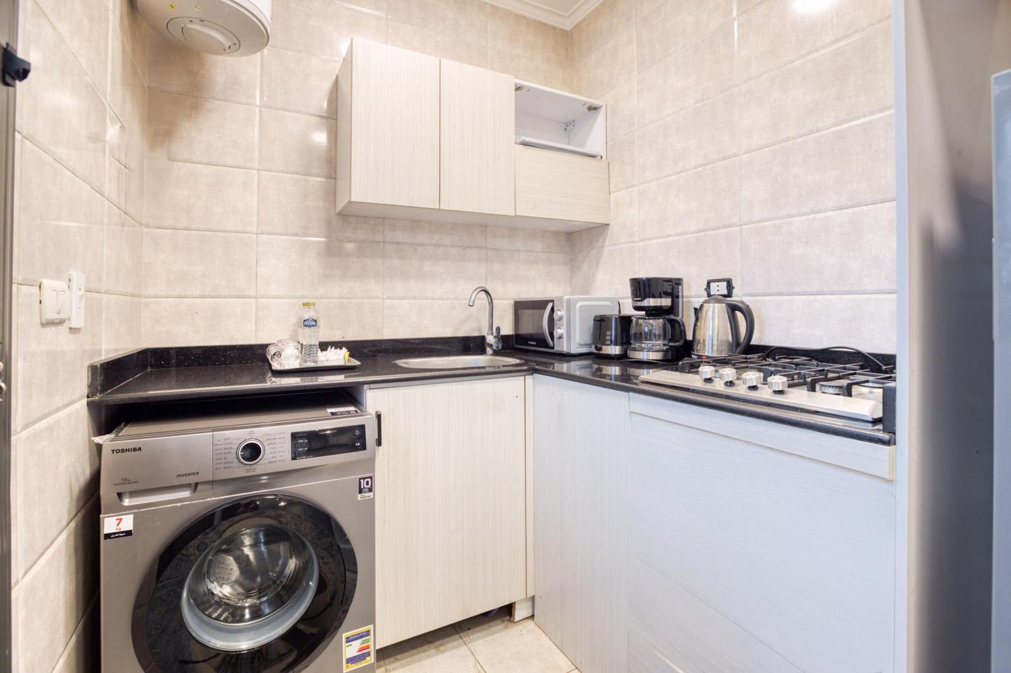 Travelholic Auc Residence Kaherah Luaran gambar