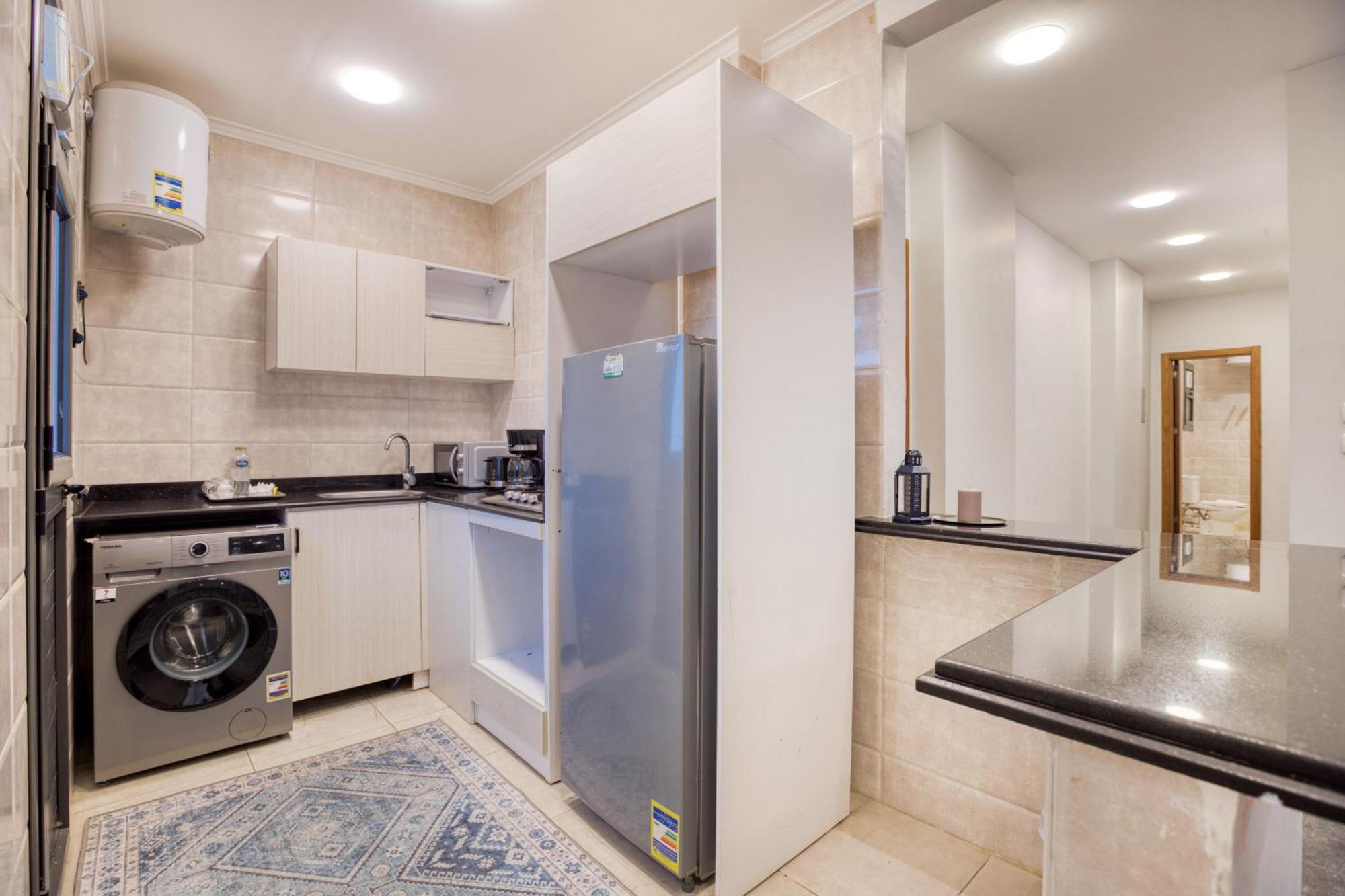 Travelholic Auc Residence Kaherah Luaran gambar