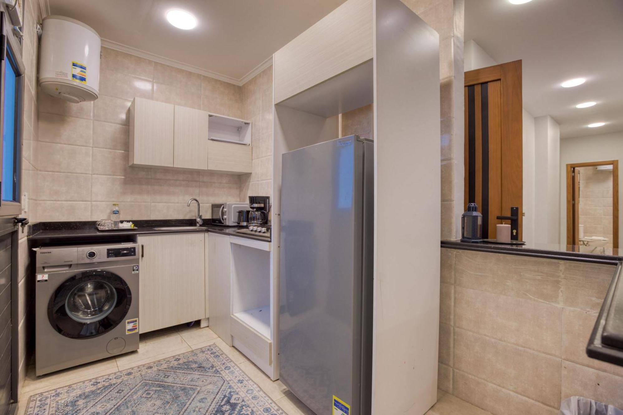 Travelholic Auc Residence Kaherah Luaran gambar
