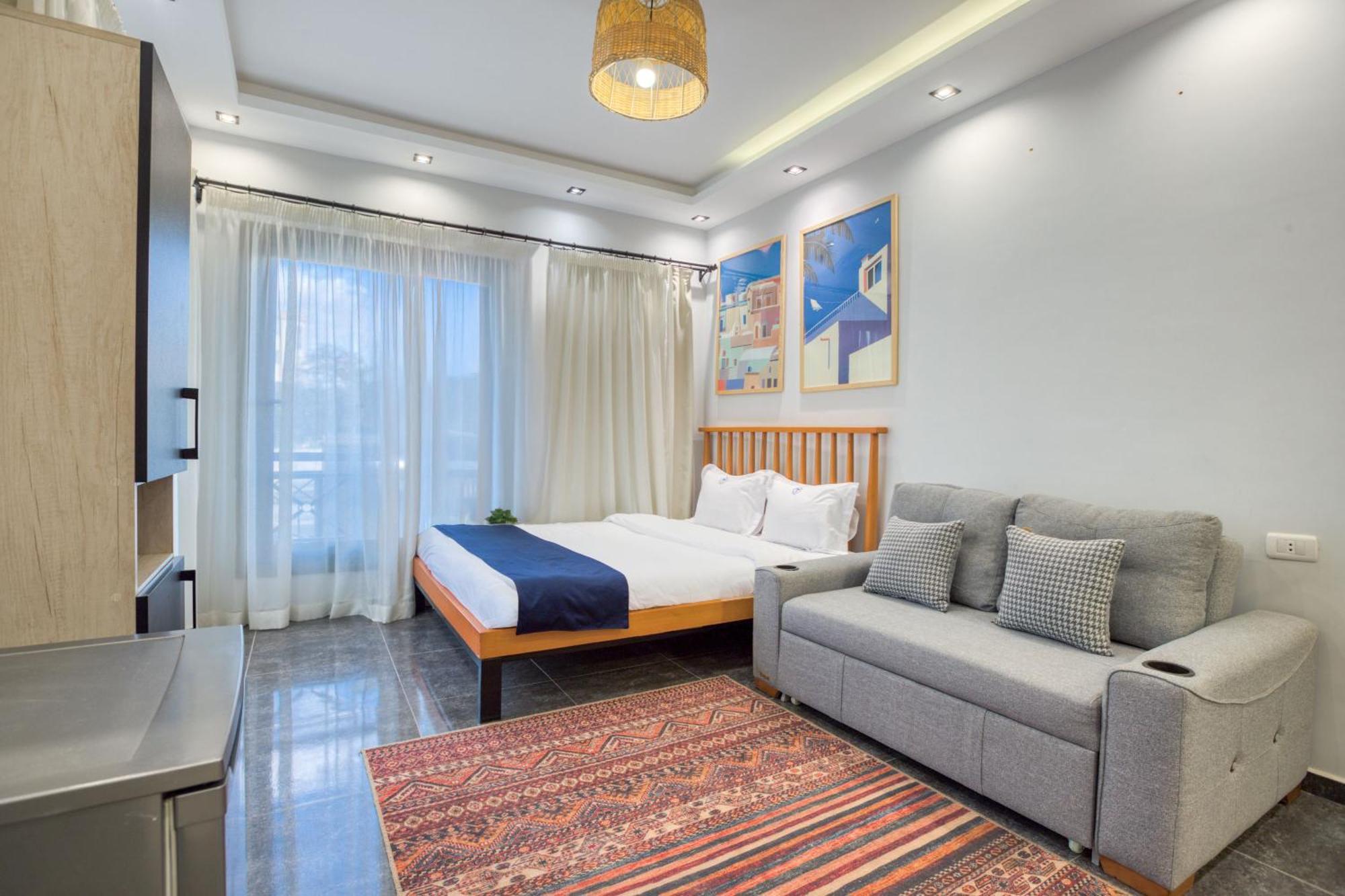 Travelholic Auc Residence Kaherah Luaran gambar