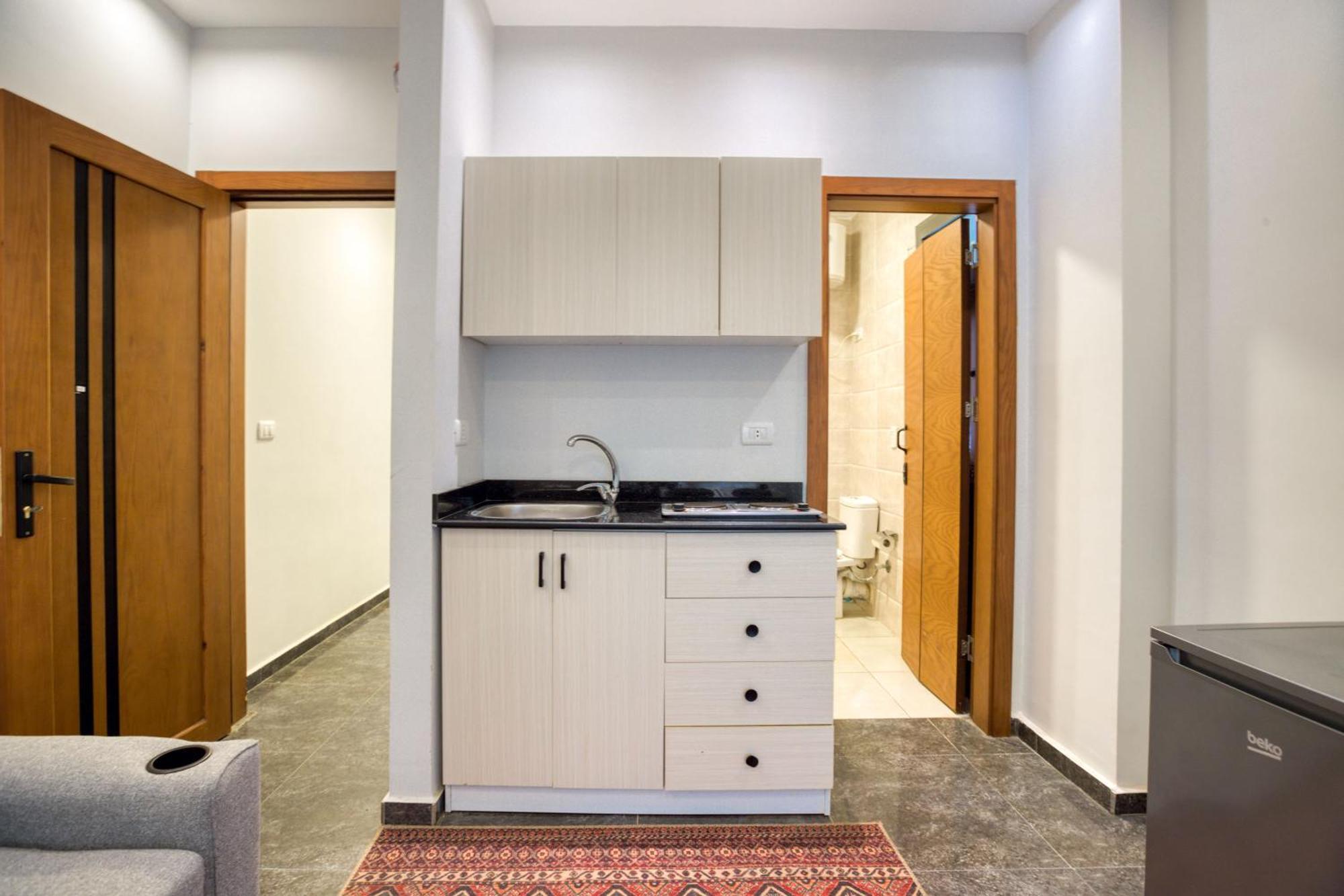 Travelholic Auc Residence Kaherah Luaran gambar