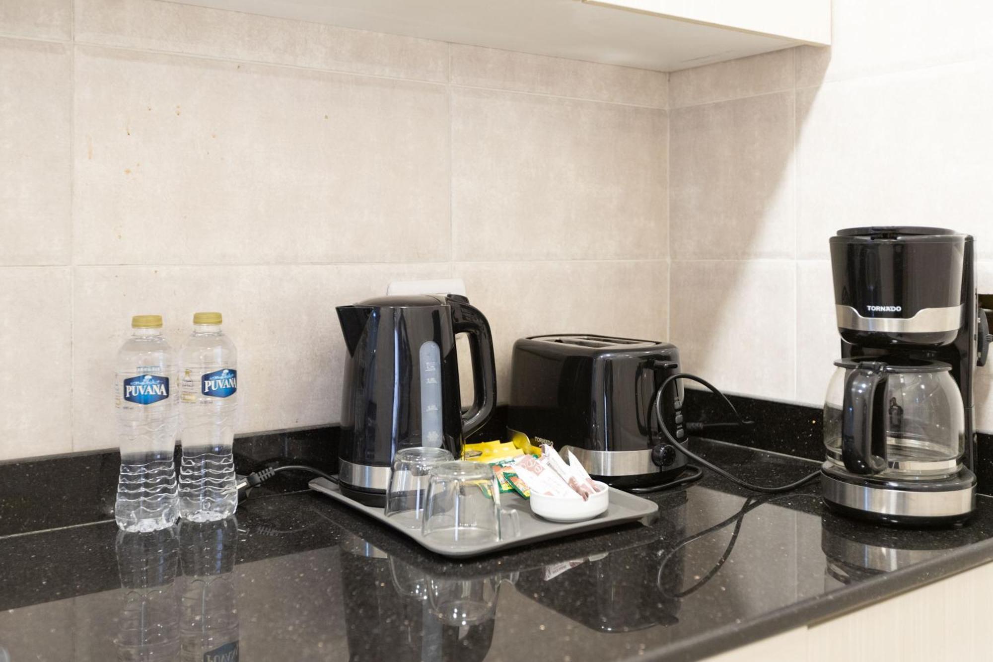 Travelholic Auc Residence Kaherah Luaran gambar